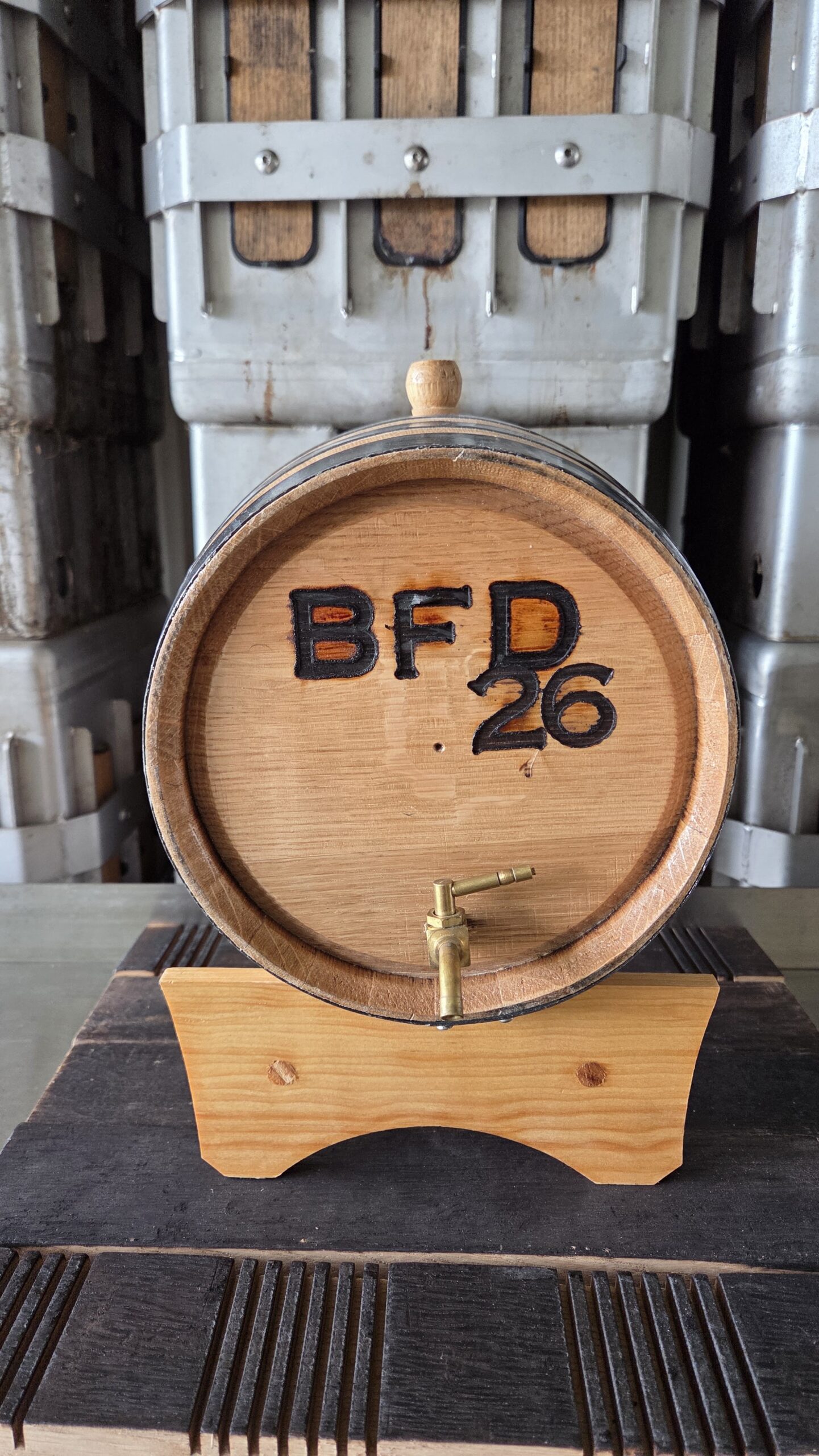 A small BFD branded custom whiskey barrel on display